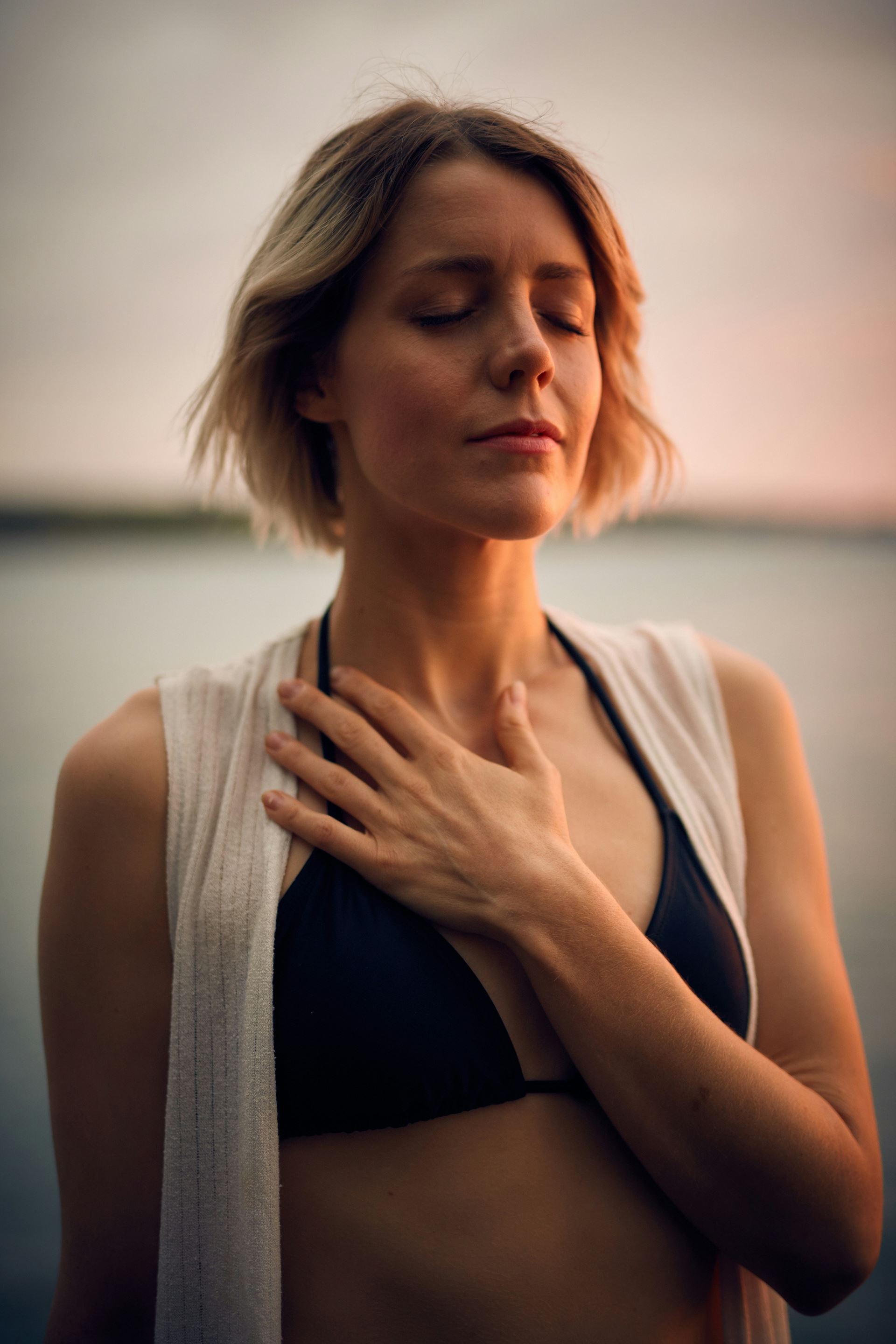 person holding chest